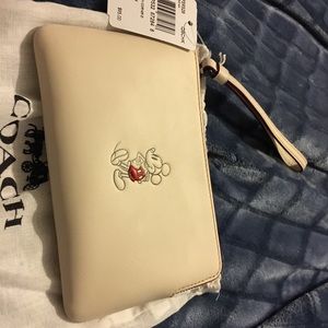 BNIB Coach cream Mickey Mouse wristlet